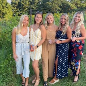 greg jumpsuit on left hand side